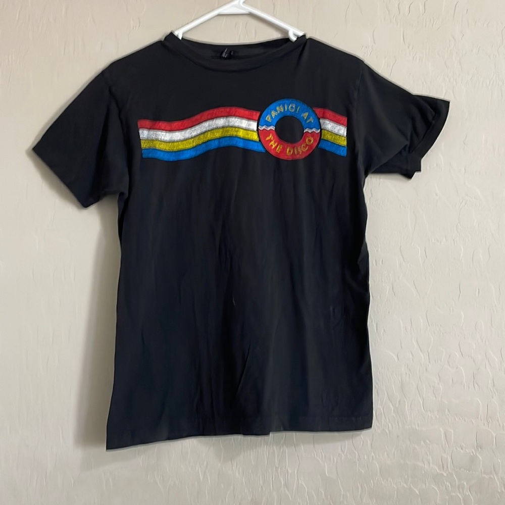 Medium black shirt with the panic at the disco logo. Worn once.
